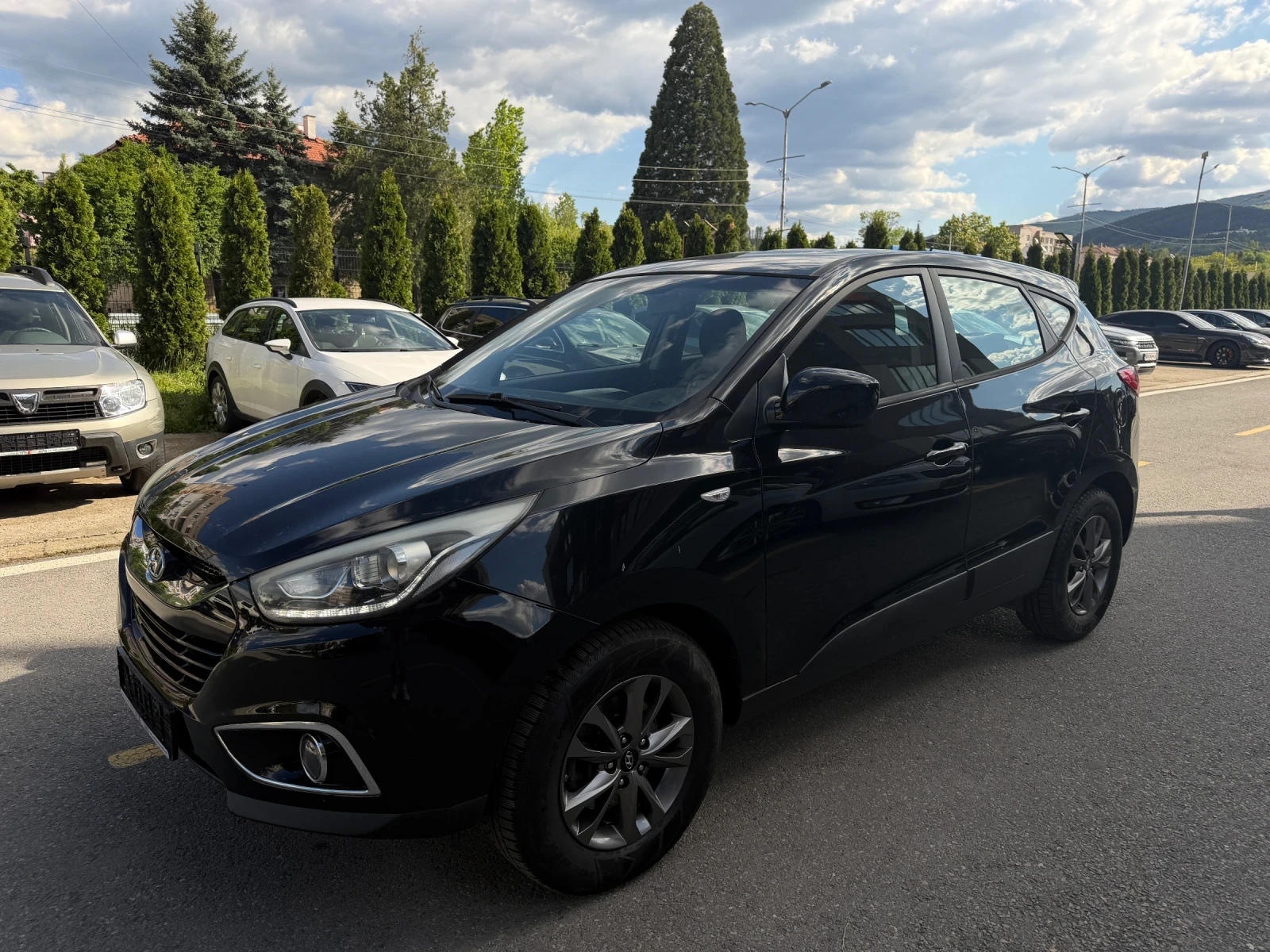 Hyundai Tucson IX35, снимка 11 - Автомобили и джипове - 54429150