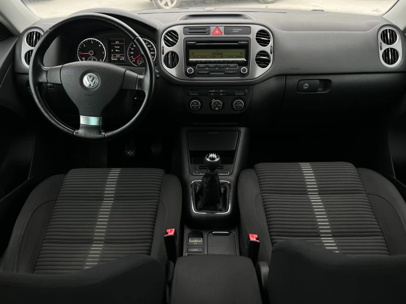 VW Tiguan 2.0TDI-140 КОНЯ, снимка 11 - Автомобили и джипове - 52842695