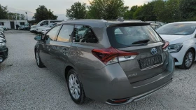 Toyota Auris 1, 8 HIBRID - 12599 € / 24641.50 лв. - 74417136 4