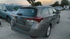 Toyota Auris 1, 8 HIBRID - 12599 € / 24641.50 лв. - 74417136 3