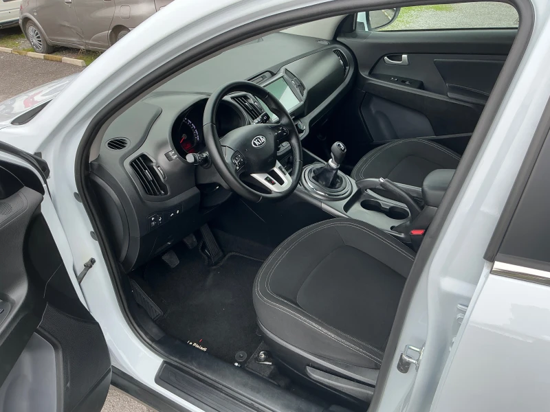 Kia Sportage 1.7 CRDI, снимка 10 - Автомобили и джипове - 52589072