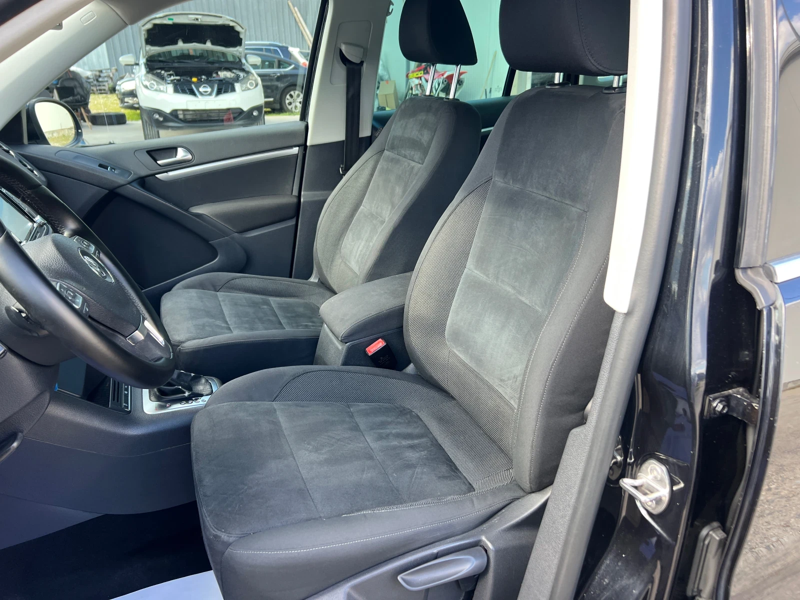 VW Tiguan 2.0TDI-140к.с./ 4Motion/ Автомат/ Парктроник, снимка 11 - Автомобили и джипове - 54165050