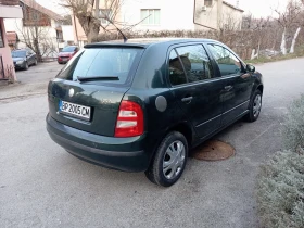 Skoda Fabia 1.4i - 999 € / 1953.87 лв. - 68403332 4