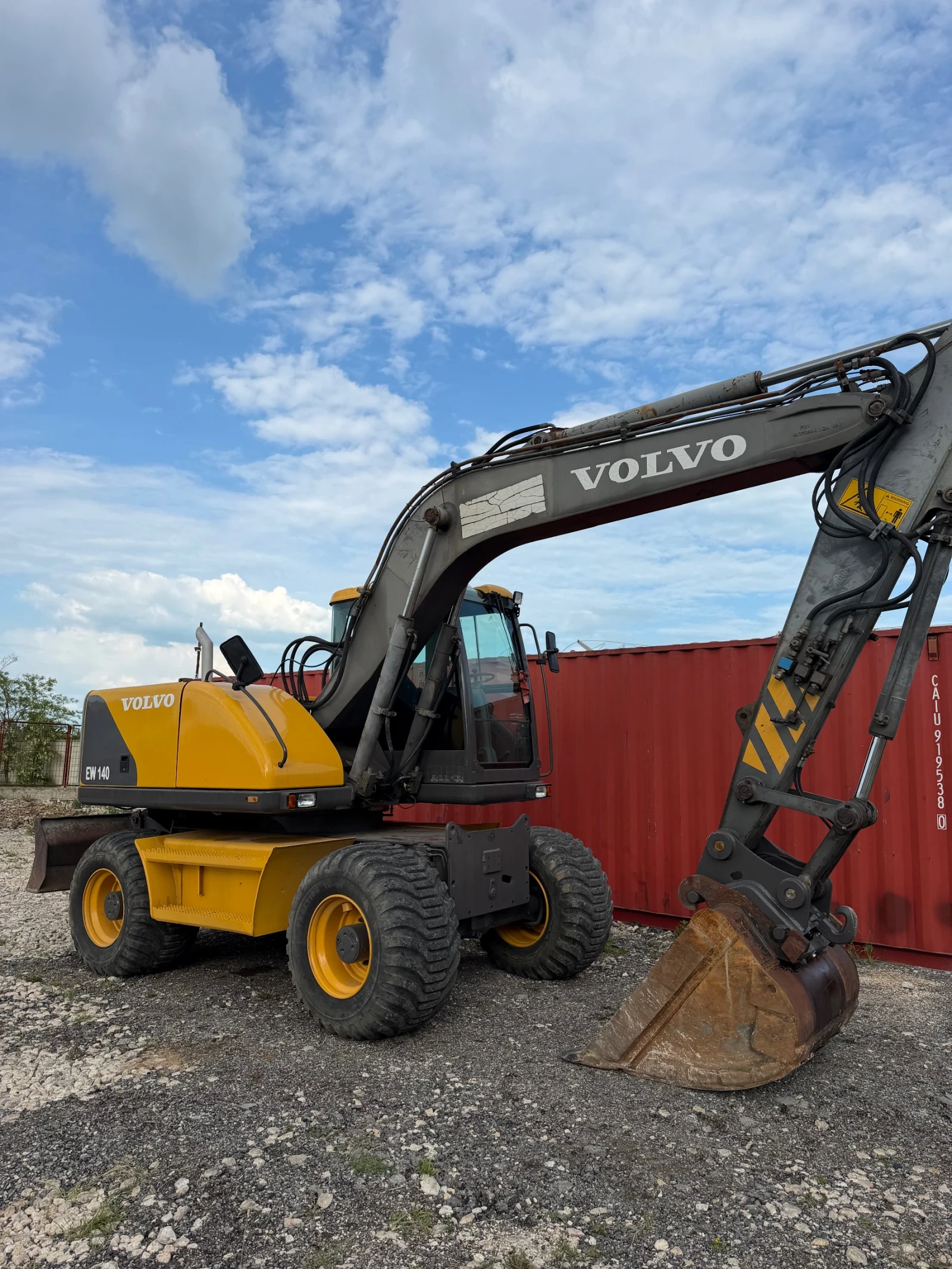 Багер Volvo Ew140