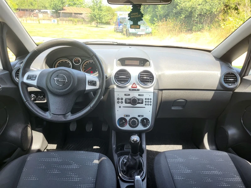 Opel Corsa 1.2i-euro5a, снимка 11 - Автомобили и джипове - 52299643