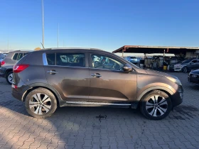 Kia Sportage 2.0CRDI 4WD AVTOMAT/NAVI/KOJA EURO 5 - 13900 лв. / 7106.96 € - 50171142 5