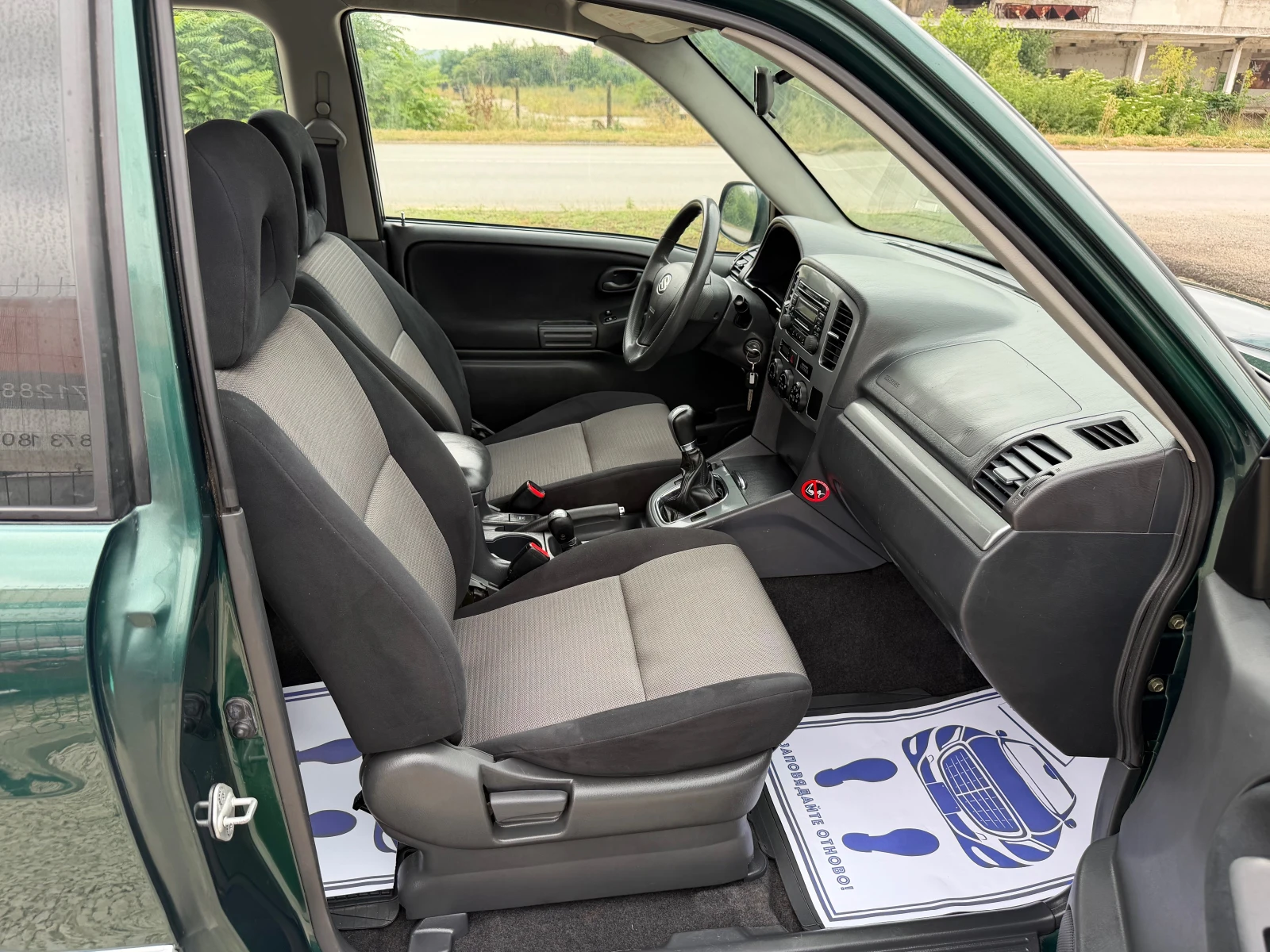 Suzuki Grand vitara 2.0HDI климатроник, снимка 10 - Автомобили и джипове - 55033742