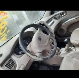 Kia Sportage 2.0i 16v - 555 € / 1085.49 лв. - 41062292 4