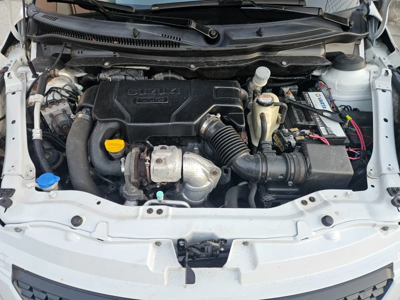 Suzuki Swift 1.3 DDiS, снимка 12 - Автомобили и джипове - 52563802