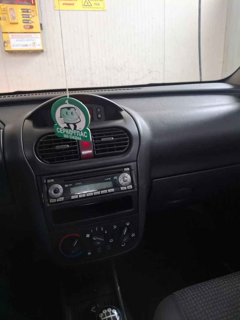 Opel Corsa 1.3 CDTI 2004 Klima, снимка 12 - Автомобили и джипове - 52591636