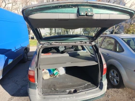 Renault Laguna 1.8i 68kW 92к.с., снимка 13