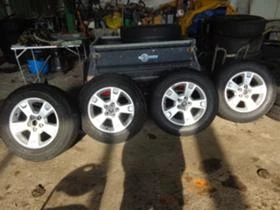 Гуми с джанти  215/70R16, снимка 1