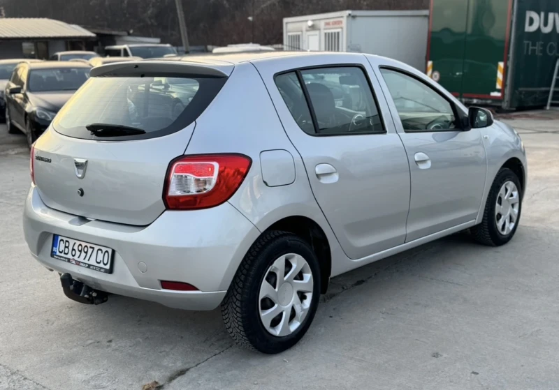Dacia Sandero ДИЗЕЛ / КАСКО / НОВИ ЗИМНИ ГУМИ/КЛИМАТИК/ТЕГЛИЧ, снимка 6 - Автомобили и джипове - 52841484