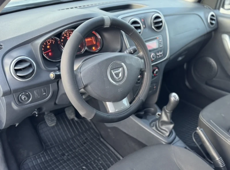 Dacia Sandero ДИЗЕЛ / КАСКО / НОВИ ЗИМНИ ГУМИ/КЛИМАТИК/ТЕГЛИЧ, снимка 9 - Автомобили и джипове - 52841484