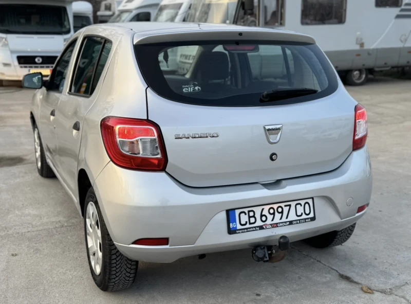 Dacia Sandero ДИЗЕЛ / КАСКО / НОВИ ЗИМНИ ГУМИ/КЛИМАТИК/ТЕГЛИЧ, снимка 8 - Автомобили и джипове - 52841484