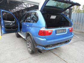     BMW X5 4.4 ~11 .