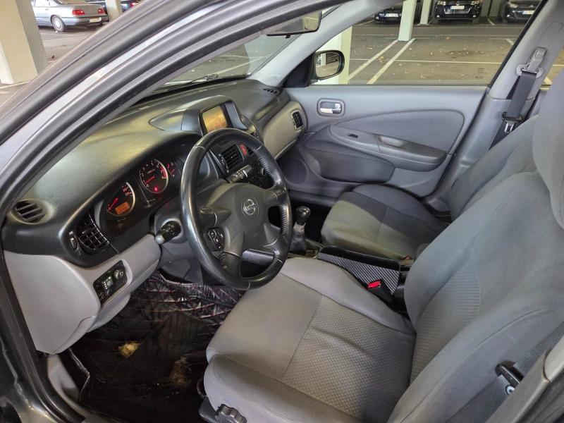 Nissan Almera 1.5 LPG, снимка 10 - Автомобили и джипове - 52971007