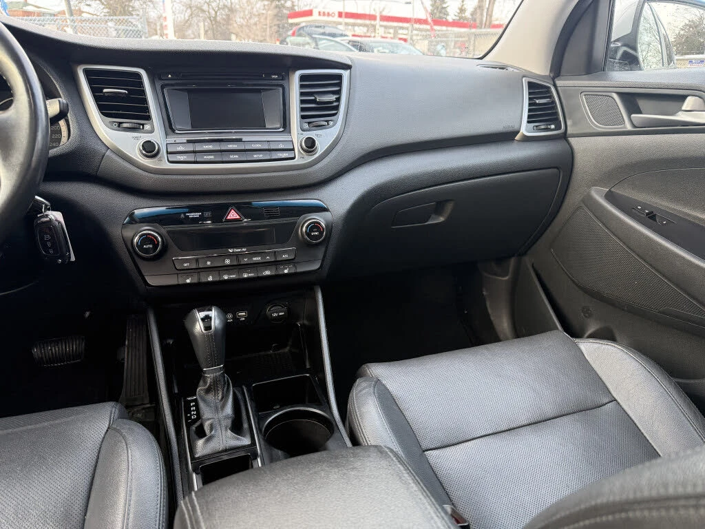 Hyundai Tucson 1.6 SE* АвтоКредит* (Цена до БГ), снимка 14 - Автомобили и джипове - 53849301