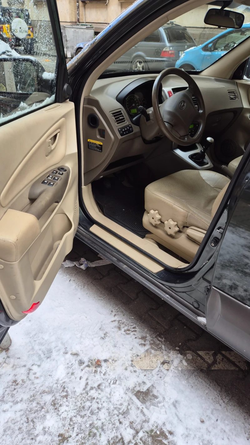 Hyundai Tucson 2.0 Crdi 16v 4x4, снимка 5 - Автомобили и джипове - 53043017