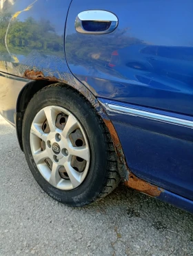 Kia Carens, снимка 6