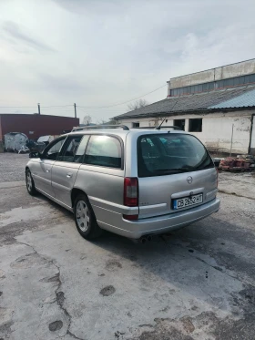 Opel Omega 2.6 V6 Elegance с шпер, LPG, ръчка, кожа, нивомат - 2600 € / 5085.16 лв. - 84959507 3