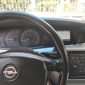 Opel Omega 2.6 V6 Elegance с шпер, LPG, ръчка, кожа, нивомат - 2600 € / 5085.16 лв. - 84959507 9