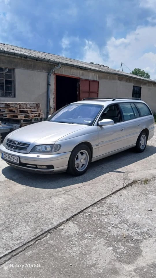 Opel Omega 2.6 V6 Elegance с шпер, LPG, ръчка, кожа, нивомат, снимка 17 - Автомобили и джипове - 54184698