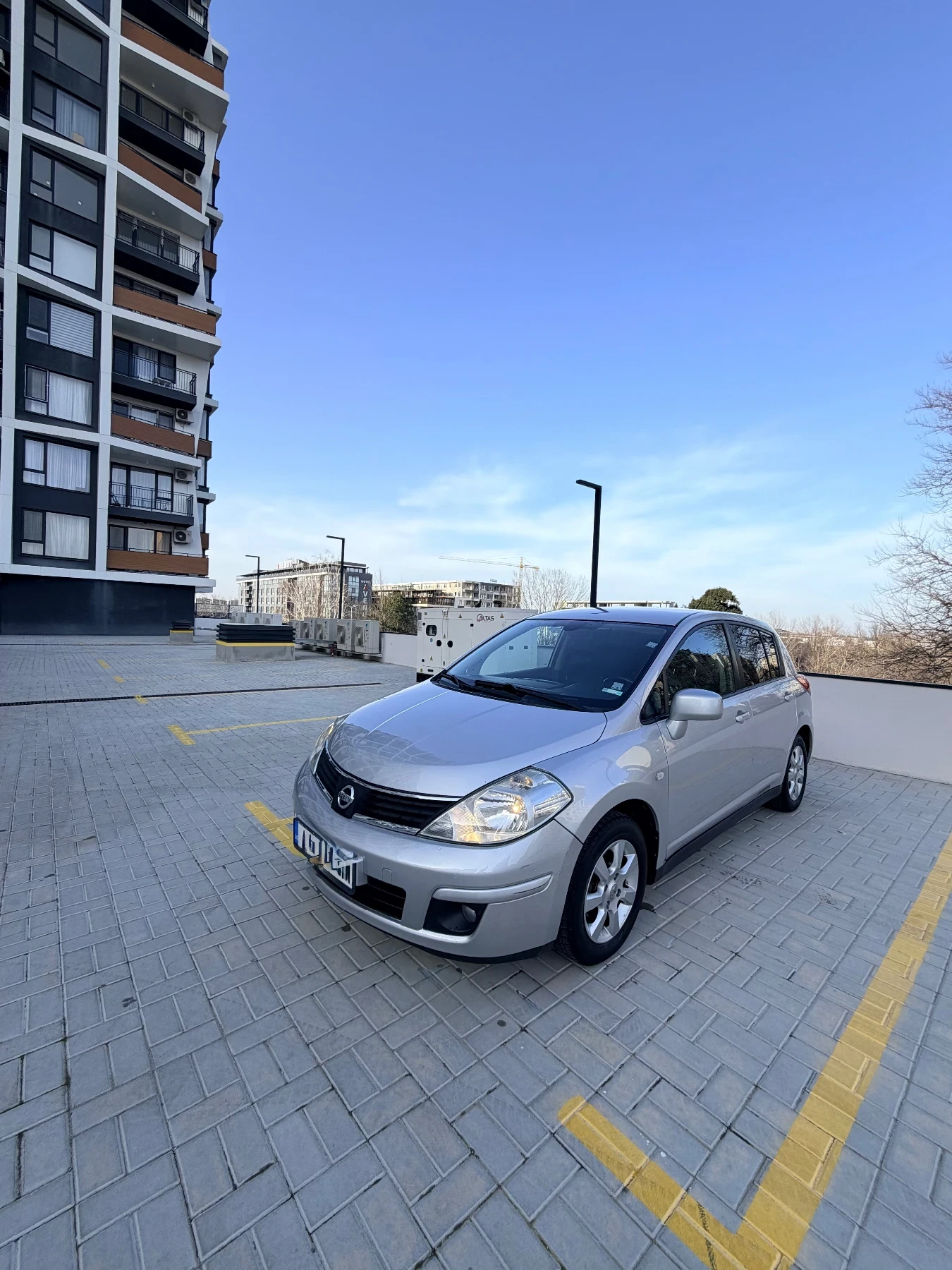 Nissan Tiida  - изображение 4