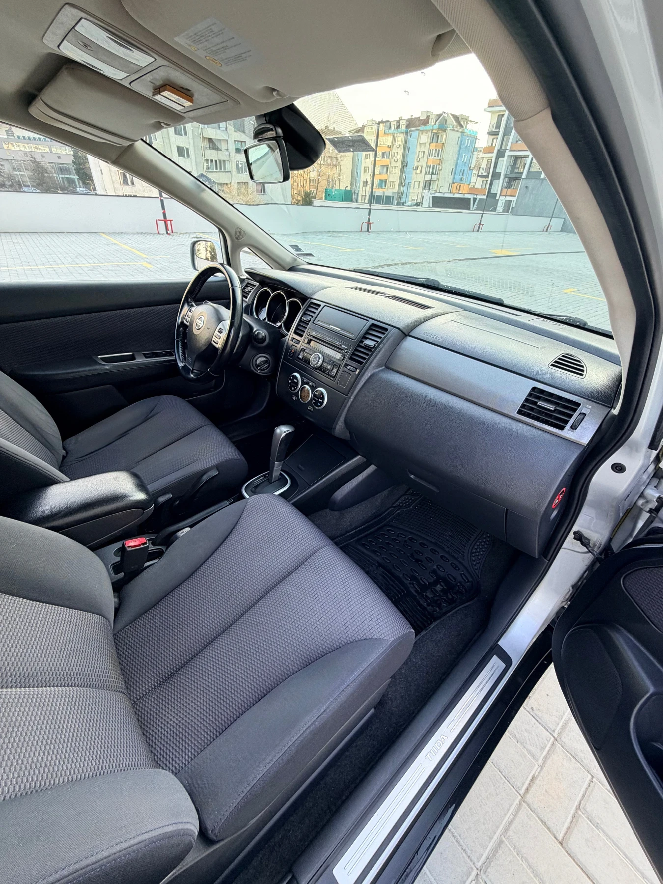 Nissan Tiida  - изображение 8