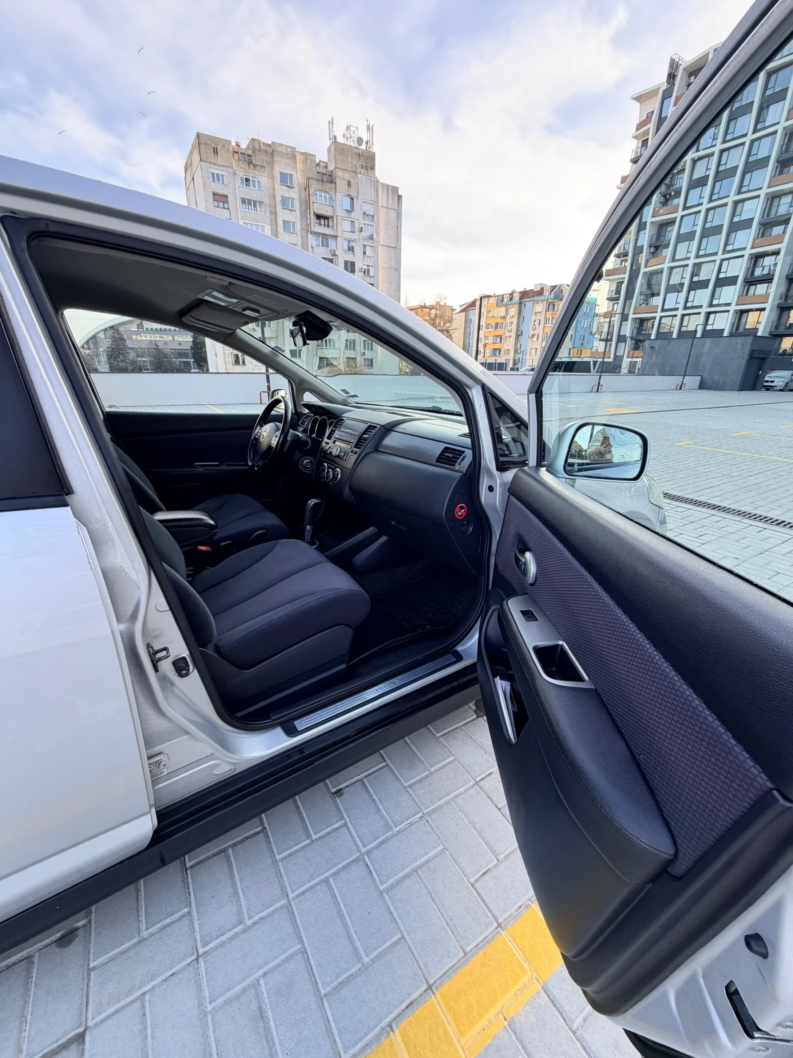 Nissan Tiida  - изображение 9