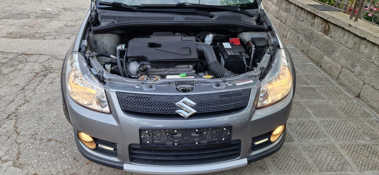 Suzuki SX4 1.6 i 107 к.с.EU-5 4x4, снимка 15 - Автомобили и джипове - 54744444