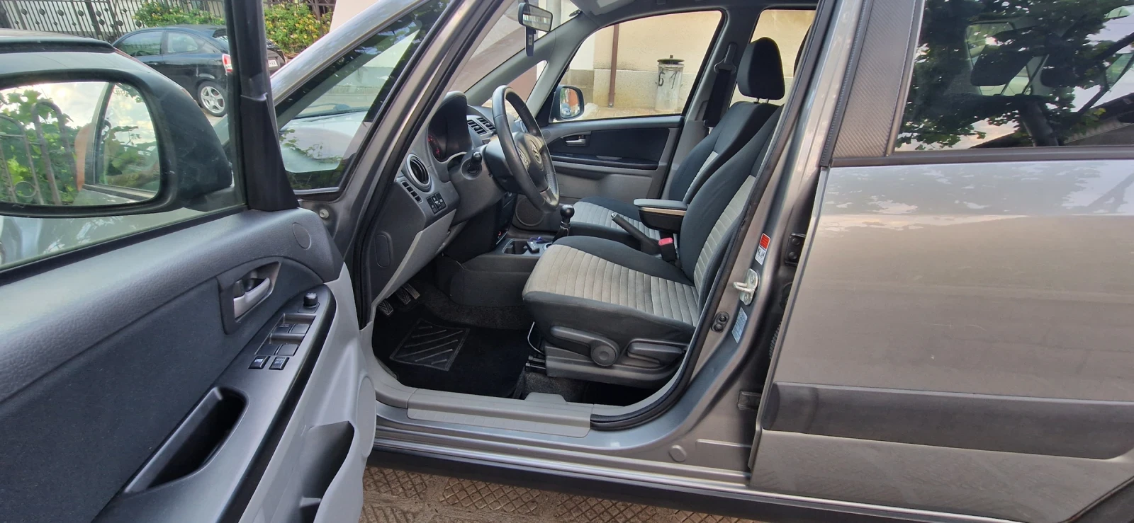 Suzuki SX4 1.6 i 107 к.с.EU-5 4x4, снимка 9 - Автомобили и джипове - 54744444