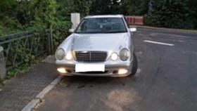      ,    Mercedes-Benz E 200