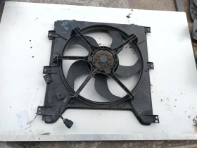 перка радиатор Санг Йонг Актион 2,3бензин