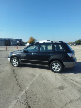 Mitsubishi Outlander 2.4i 4x4 - 3400 лв. / 1738.39 € - 22244326 4
