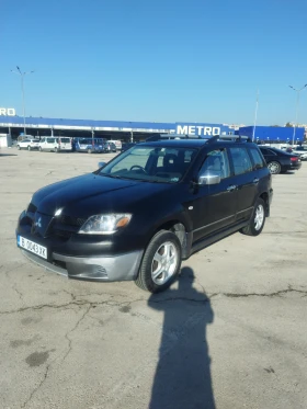 Mitsubishi Outlander 2.4i 4x4 - 3400 лв. / 1738.39 € - 22244326 3
