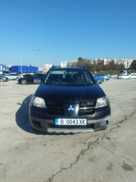 Mitsubishi Outlander 2.4i 4x4 - 3400 лв. / 1738.39 € - 22244326 2