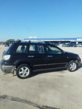 Mitsubishi Outlander 2.4i 4x4 - 3400 лв. / 1738.39 € - 22244326 7