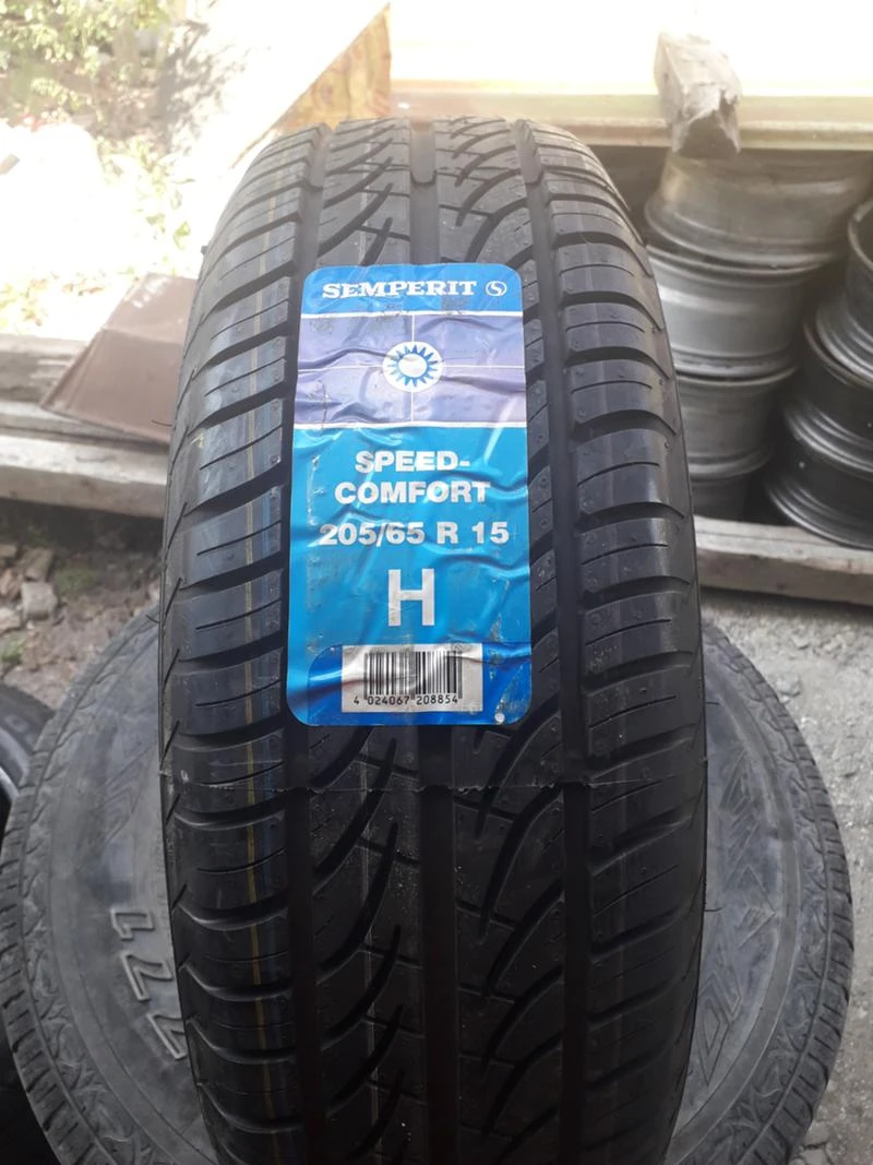 Гуми Летни 205/65R15, снимка 1 - Гуми и джанти - 26430785