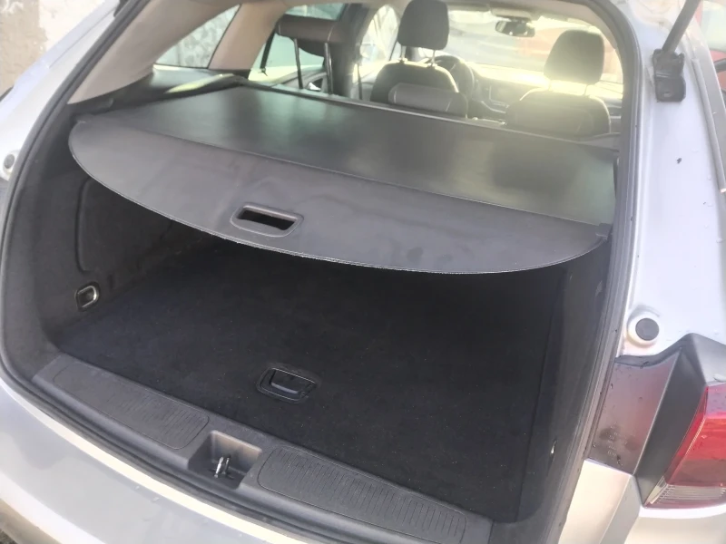 Opel Astra 1.6TDCI , снимка 12 - Автомобили и джипове - 52339038