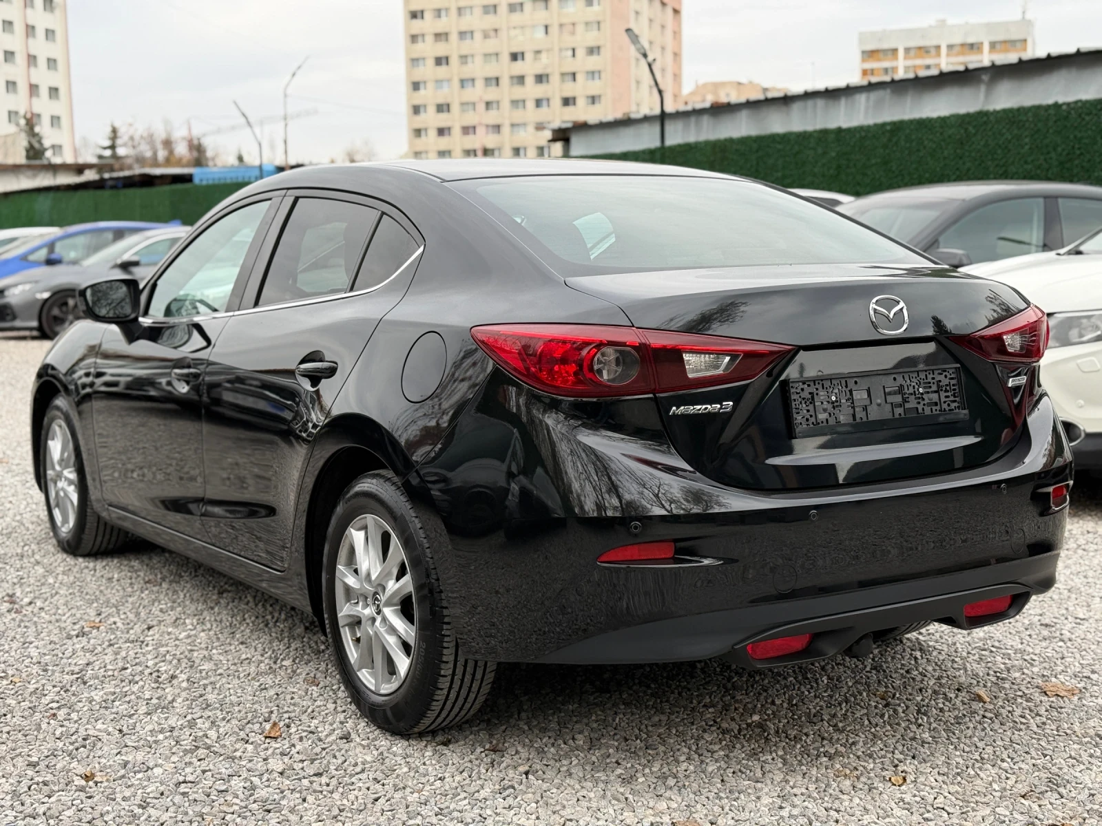 Mazda 3 1.5i/101hp/СЕДАН - изображение 5