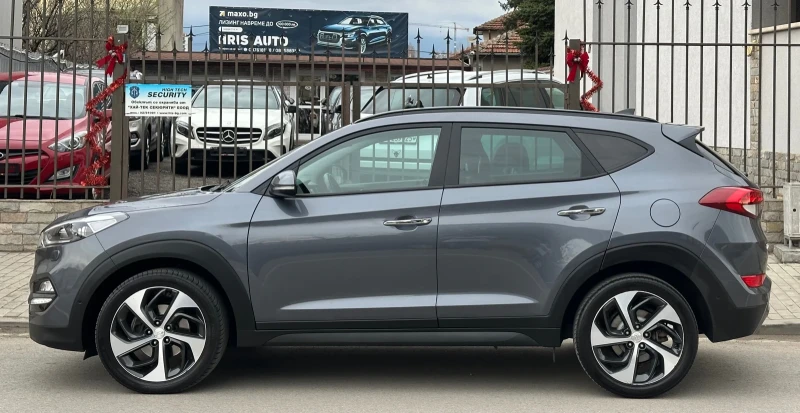Hyundai Tucson 2.0 CRDI/4x4/Автоматик/Панорама/Кожа/Швейцария , снимка 6 - Автомобили и джипове - 53000931