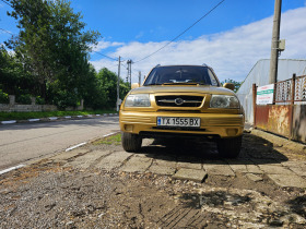 Suzuki Vitara Гранд Витара, снимка 14 - Автомобили и джипове - 45730992