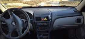 Nissan Almera 1.5 бензин , снимка 9