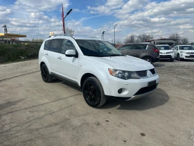 Mitsubishi Outlander 2.4-AUTOMAT-4x4-CH-ТОПСЪСТОЯНИЕ-7-МЕСТА-БЕЗ-РЪЖДА!, снимка 7