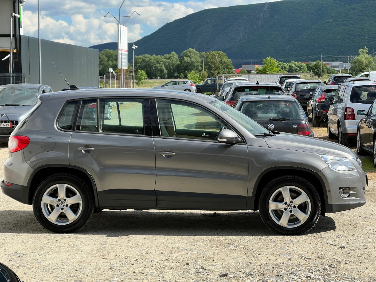 VW Tiguan 1.4TSI-150к.с./ 4х4 / Кожа/ Подгряване/ Панорама, снимка 4 - Автомобили и джипове - 54567513
