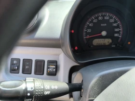 Nissan Pixo Газ-бензин Евро 5, снимка 8