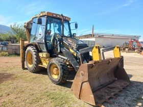      Cat 428D