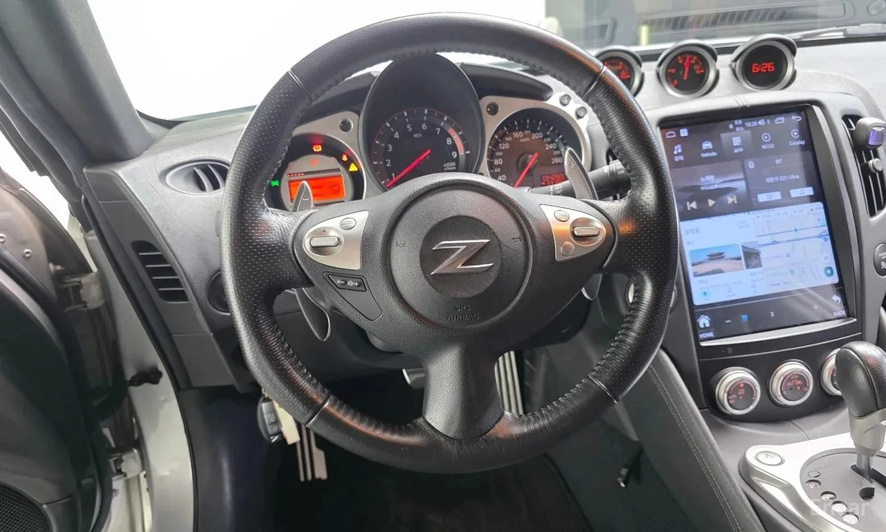 Nissan 370Z 3.7 Coupe| ОПЦИЯ ЗА ФИНАНСИРАНЕ| , снимка 13 - Автомобили и джипове - 56116845