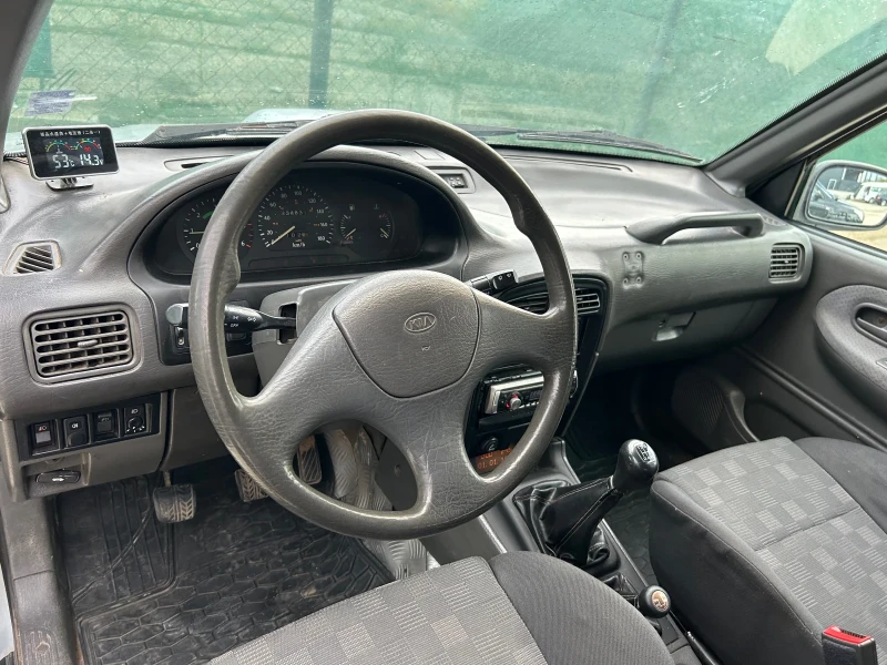 Kia Sportage 2.0 TD, снимка 11 - Автомобили и джипове - 47208724